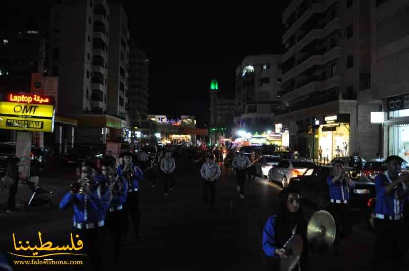 (تحت المقال - 14) - جمعية الكشافة الفلسطينية - مفوضية صيدا تشارك في مسيرة ليلة القدر