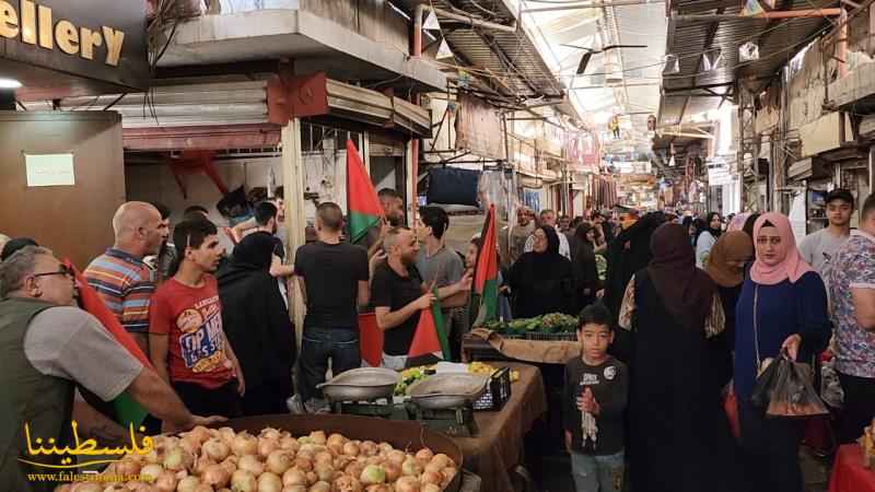 (تحت المقال - 5) - جماهيرُ شعبنا في مخيّمات وتجمُّعات لبنان ترفعُ الأعلامَ الفلسطينيةَ تنديدًا بمسيرة الأعلام في القدس المحتلة