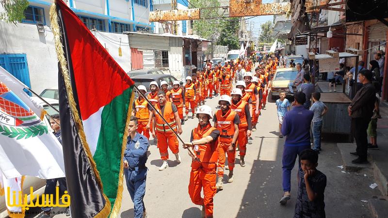 مسيرة مشتركة لوحدة الإسعاف والطوارئ وأفواج الإطفاء الفلسطينية في مخيم عين الحلوة